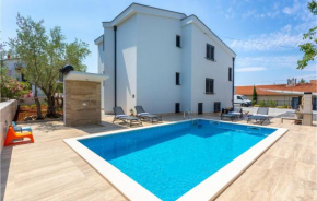 Amazing apartment in Malinska with Outdoor swimming pool, WiFi and 2 Bedrooms
